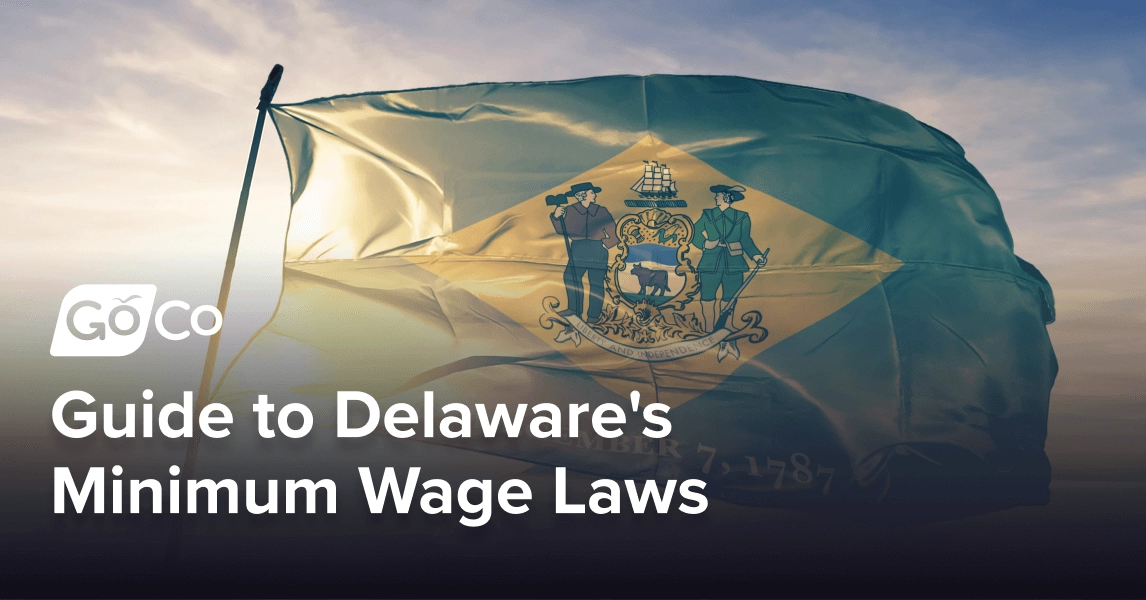 The Delaware state flag flying in the wind during the early morning sunlight.