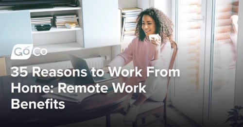 Cheerful woman working on her laptop from home.