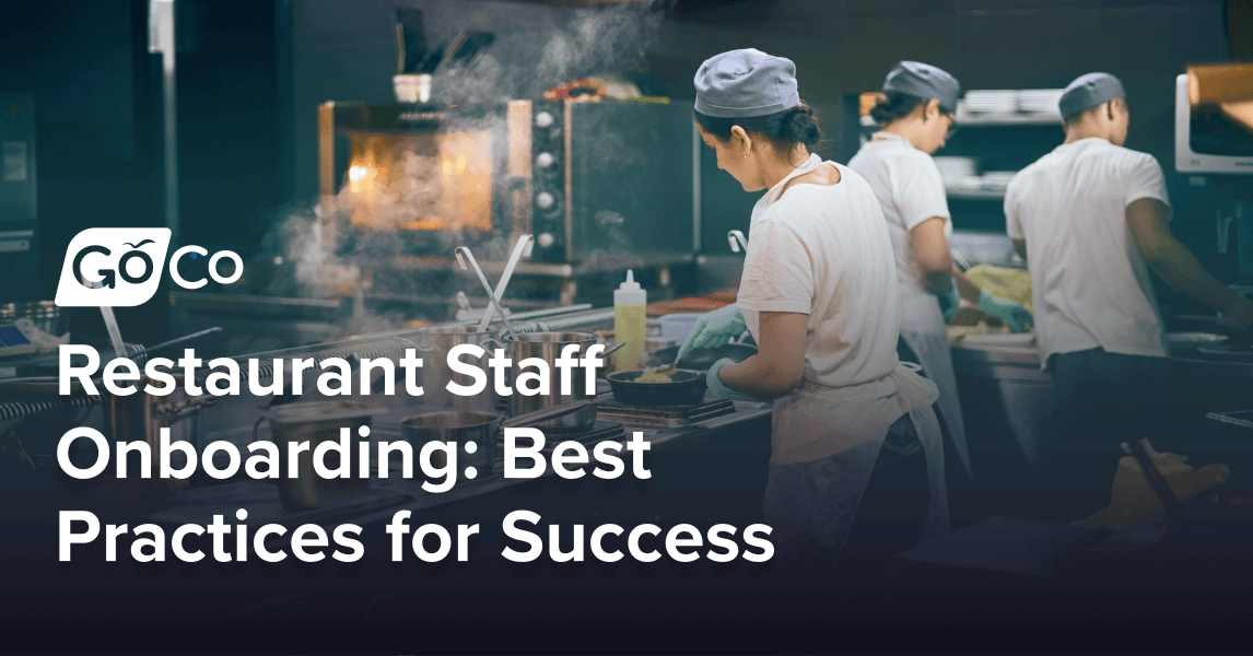 a busy restaurant kitchen with cooks and dishwashers working.